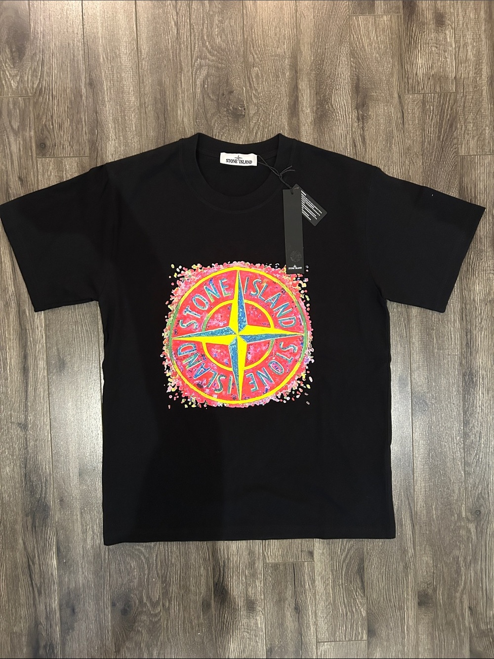 Stone Island Black Tee with Neon Compass Emblem